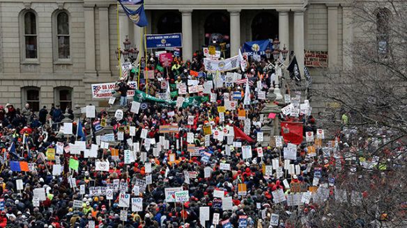 Photo of protestors outside the Michigan state capitol building